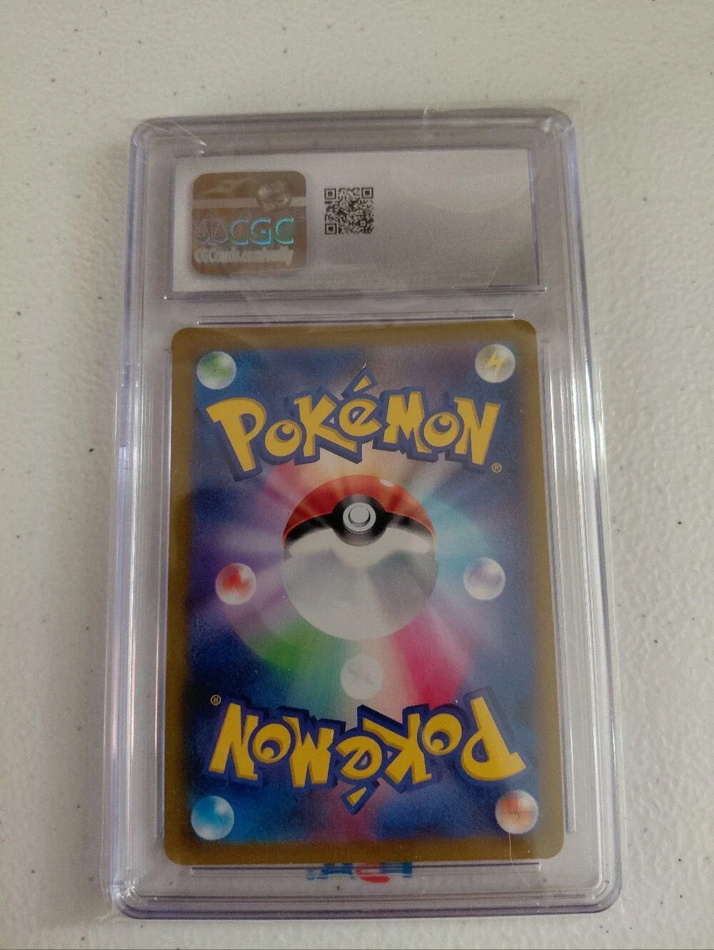 Graded Dragonite V Pokémon Card - Yellow/Green Holo CGC MINT 1O